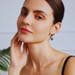 Nyx – 9–9.5mm Black Tahitian Pearl Hook Earrings in 18K Solid Gold
