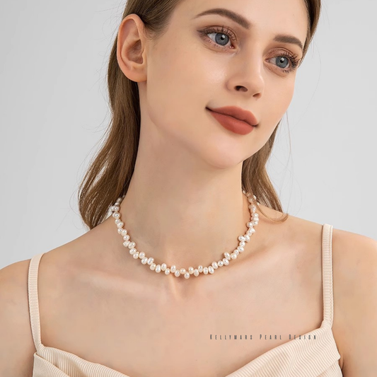 Minimalist 3–4.5mm baroque pearl necklace with 18K gold plated chain worn by a model
