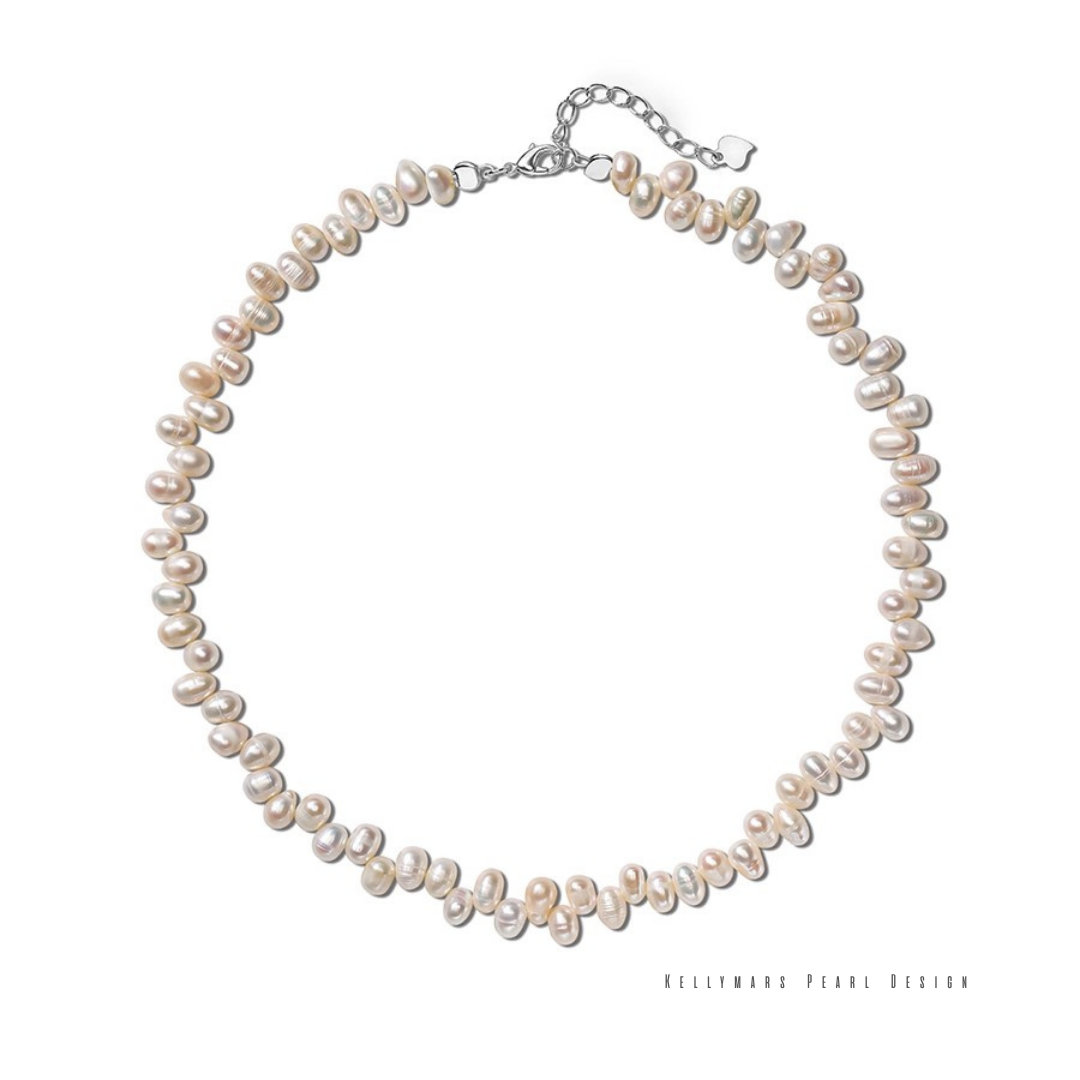 Stylish 18K gold plated necklace adorned with 3–4.5mm natural baroque pearls – the Faye collection